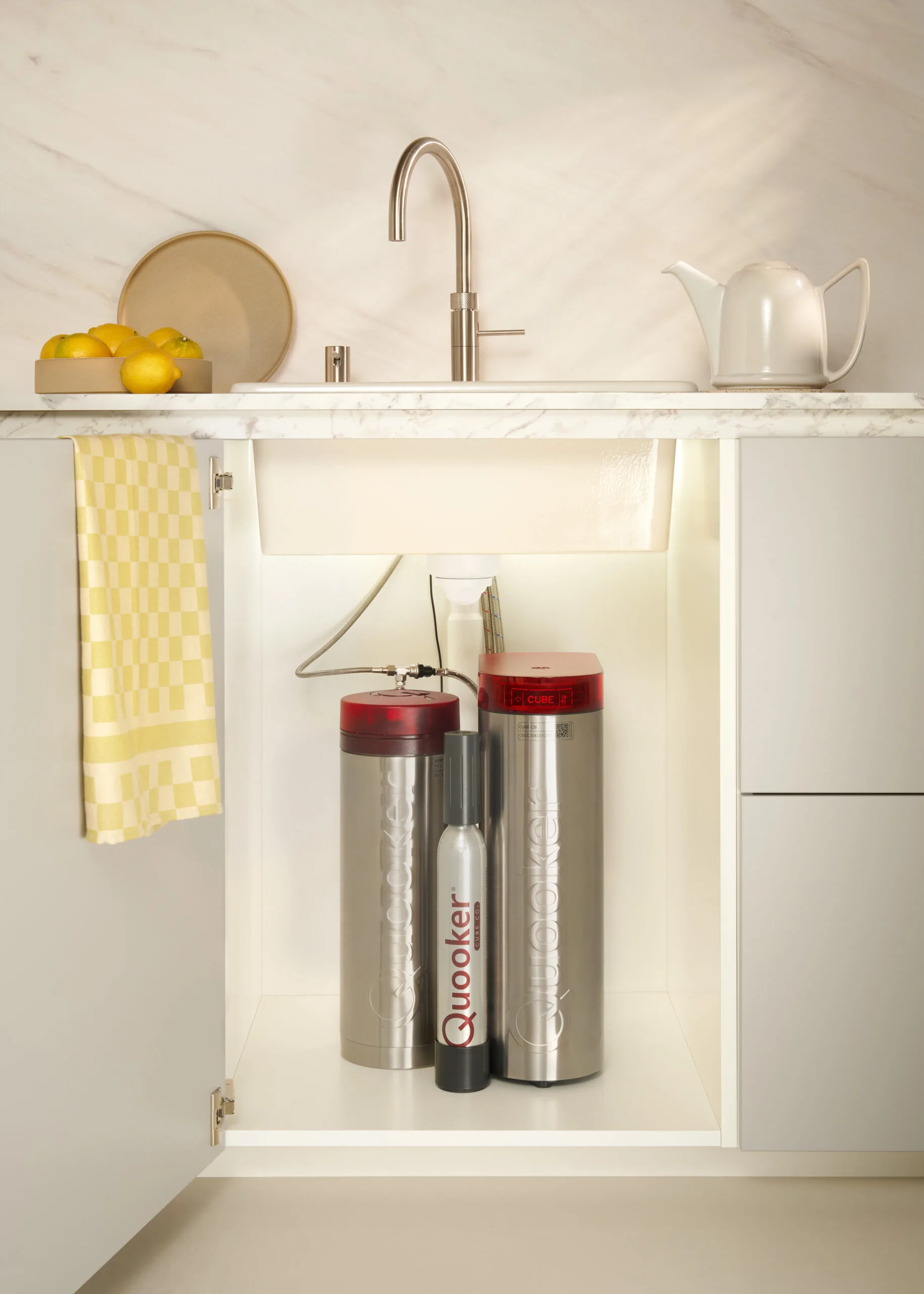 Quooker Pro3 tank and CUBE chiller with CO2 cylinder installed under a kitchen sink