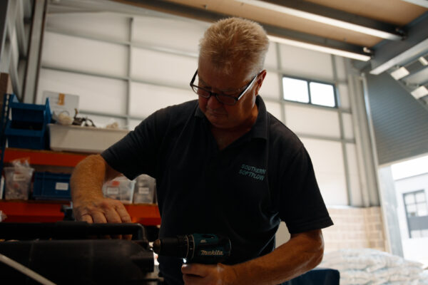 Water softener servicing by a Southern Softflow engineer